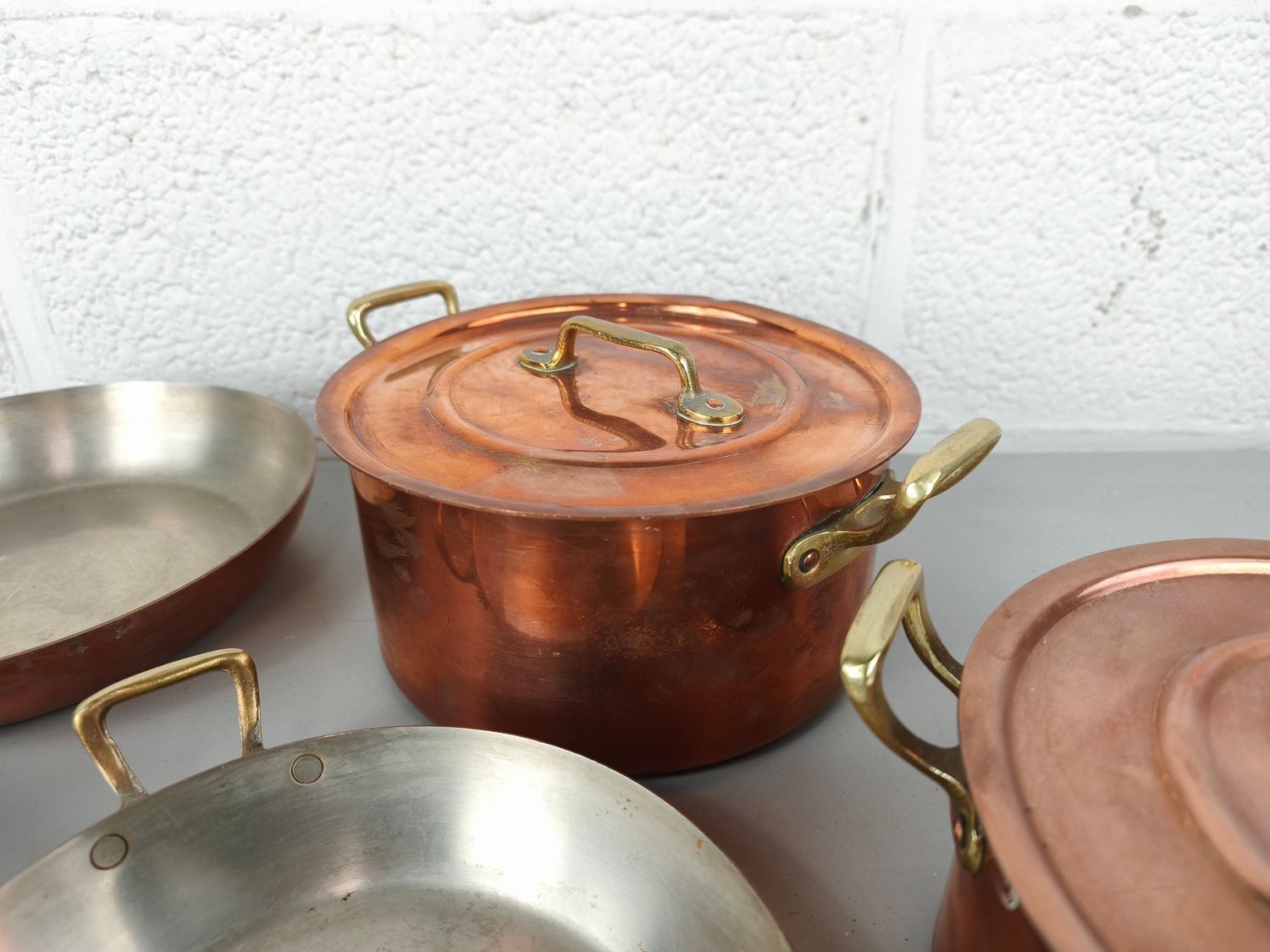 Set of copper pots and pans