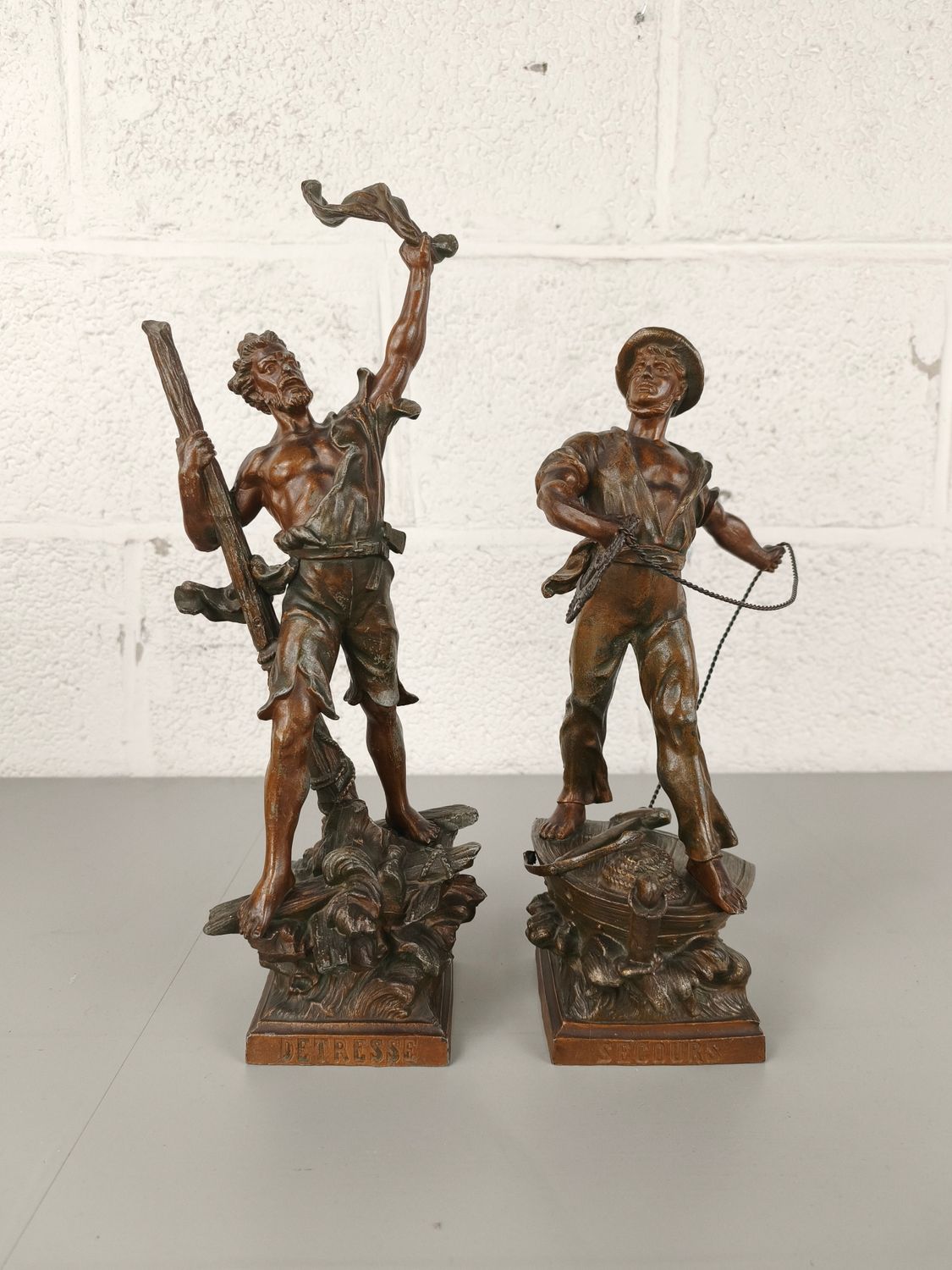 Pair of zamak sculptures