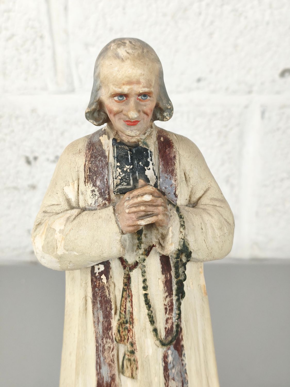 Plaster statue of Saint John Vianney