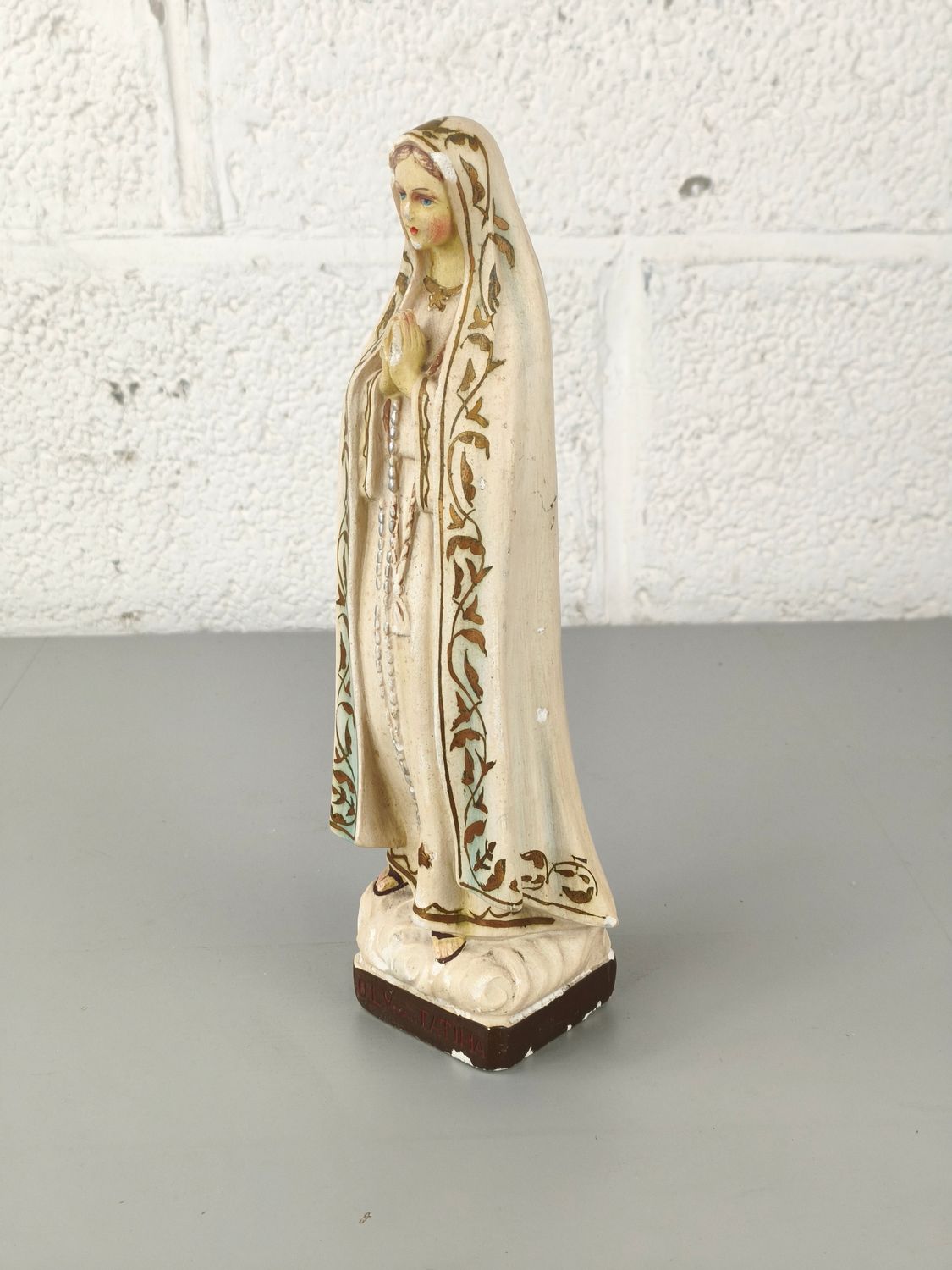 Plaster statue of the Lady of Fatima