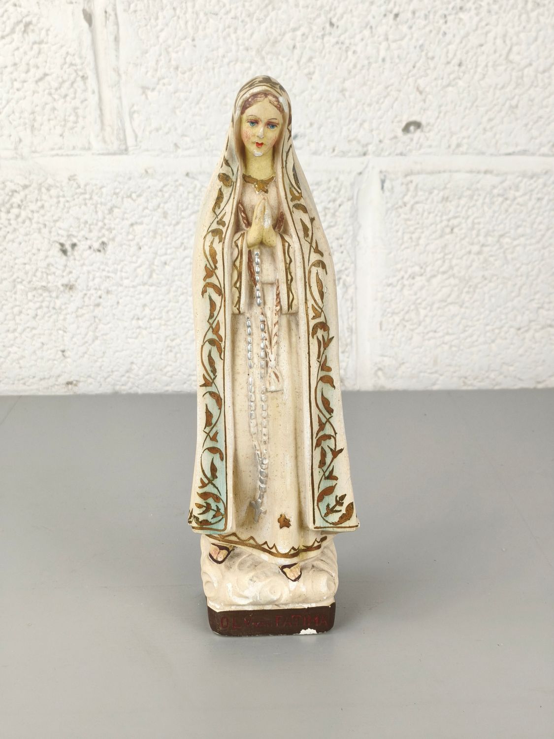 Plaster statue of the Lady of Fatima