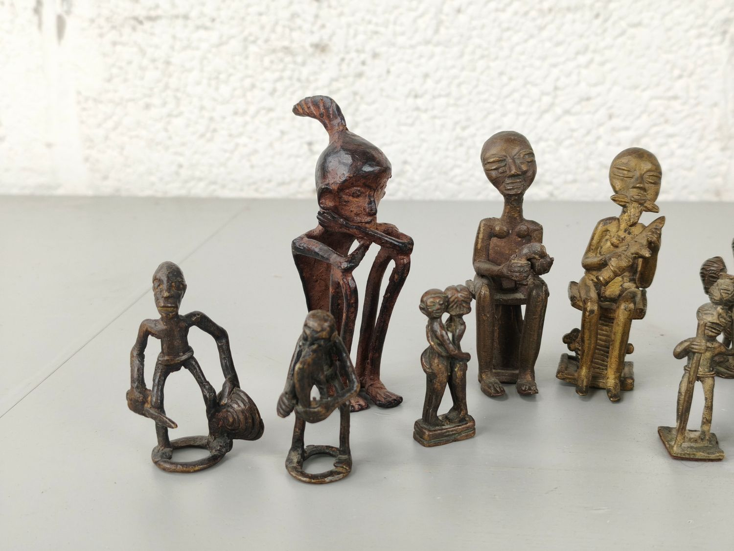 12 African bronze figurines