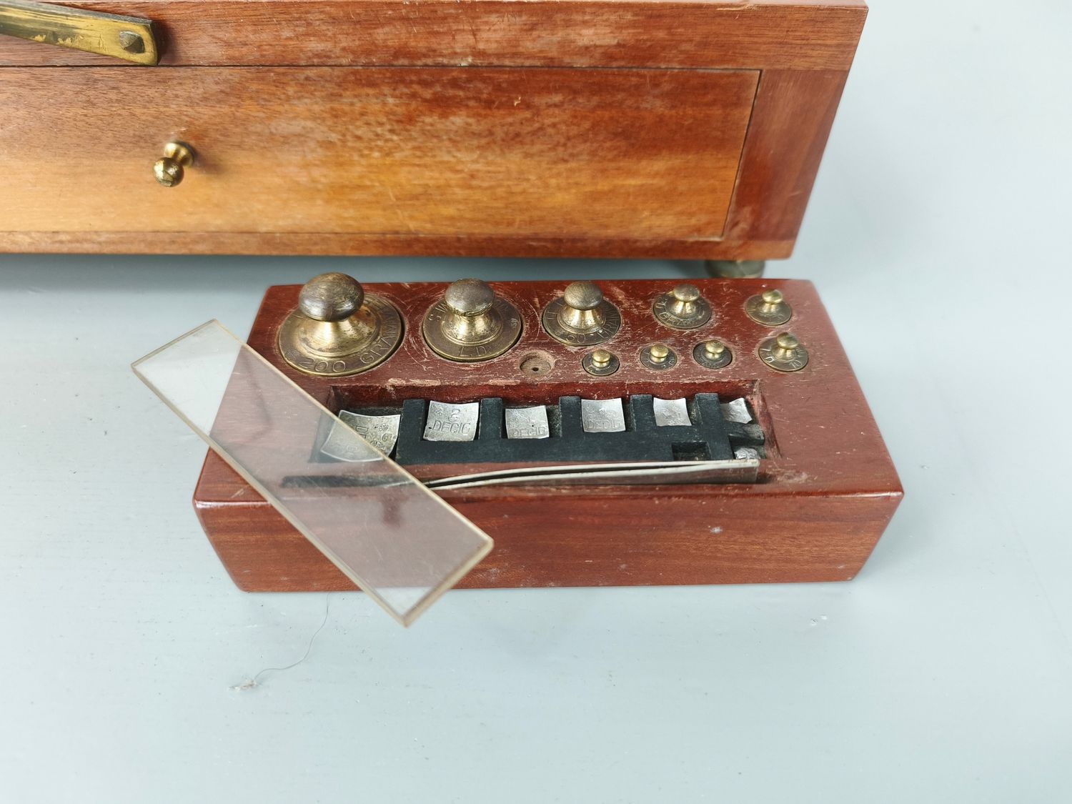 Old apothecary scale with weights