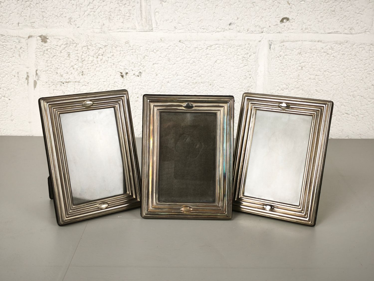 3 silver-plated photo frames