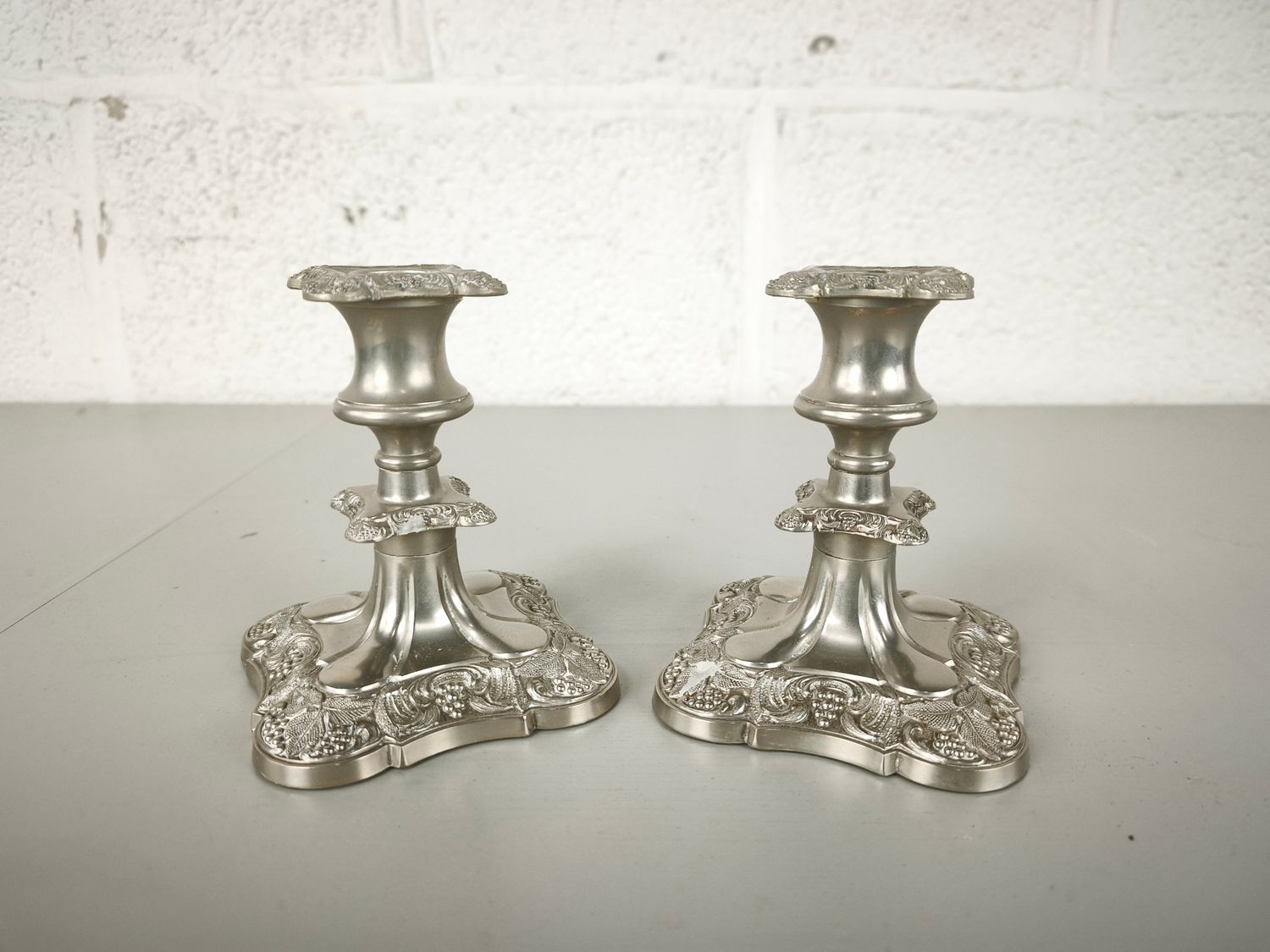 Pair of silver-plated candlesticks