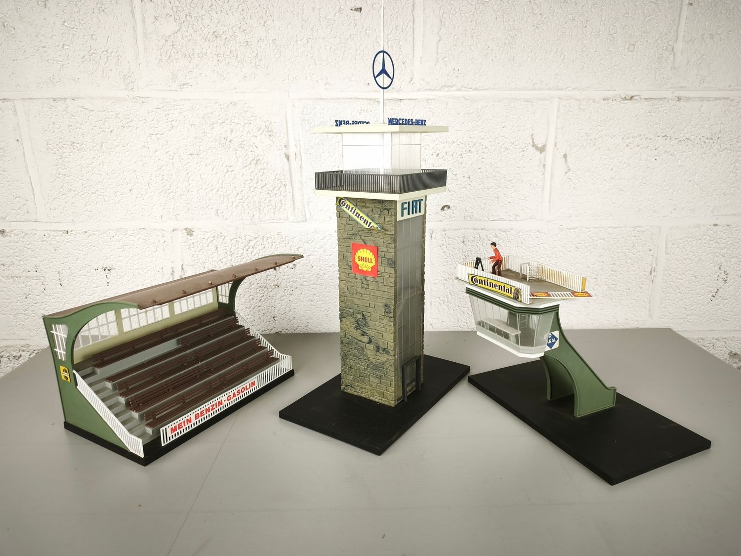 3 miniature racetrack models