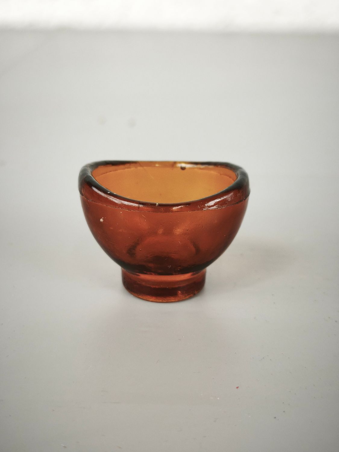 Old glass eye-bath
