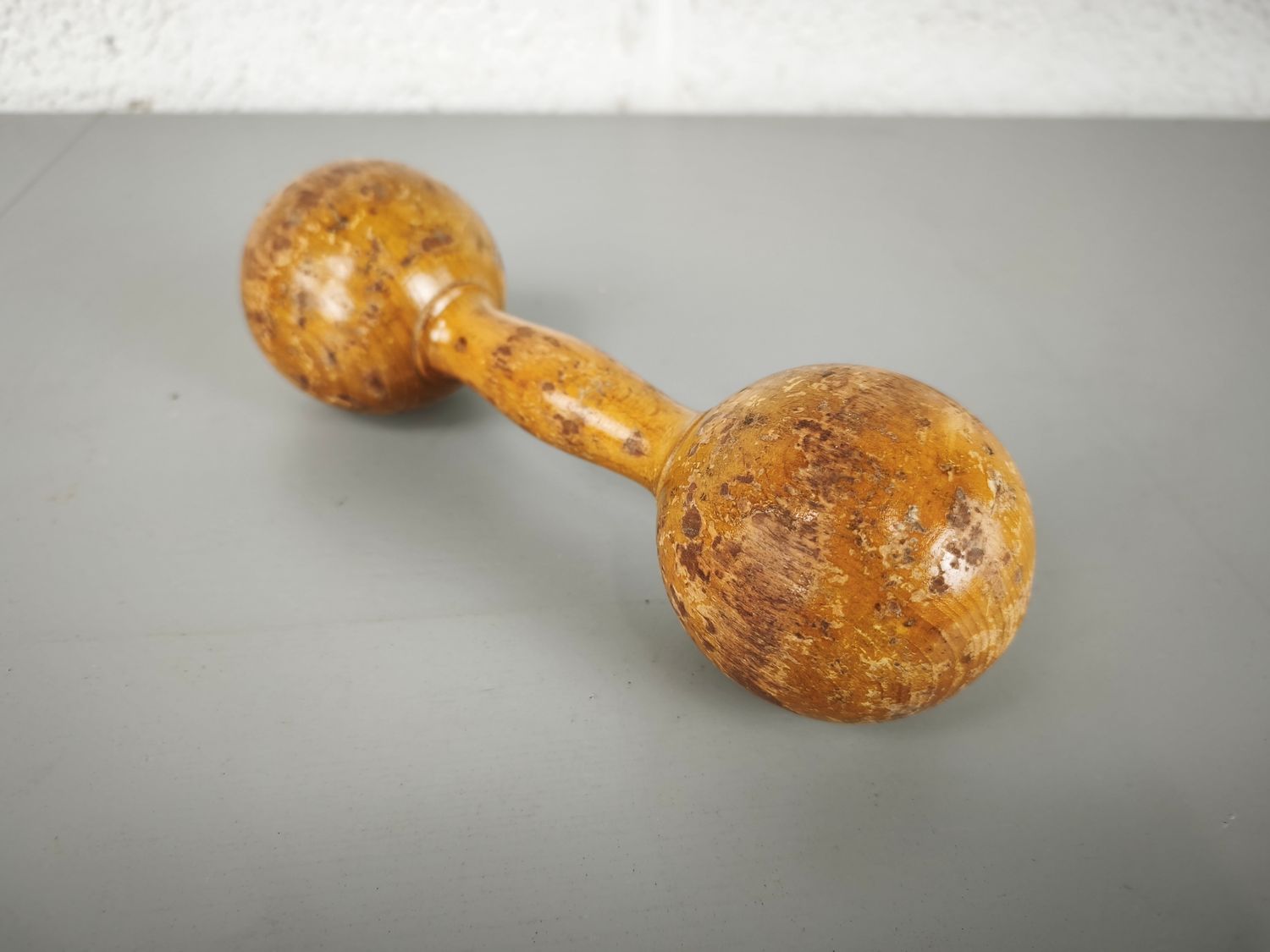 Old wooden dumbbell