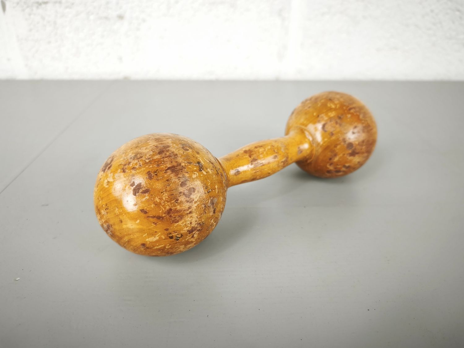 Old wooden dumbbell