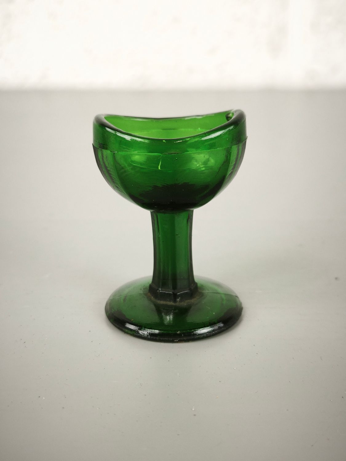 Old glass eye-bath