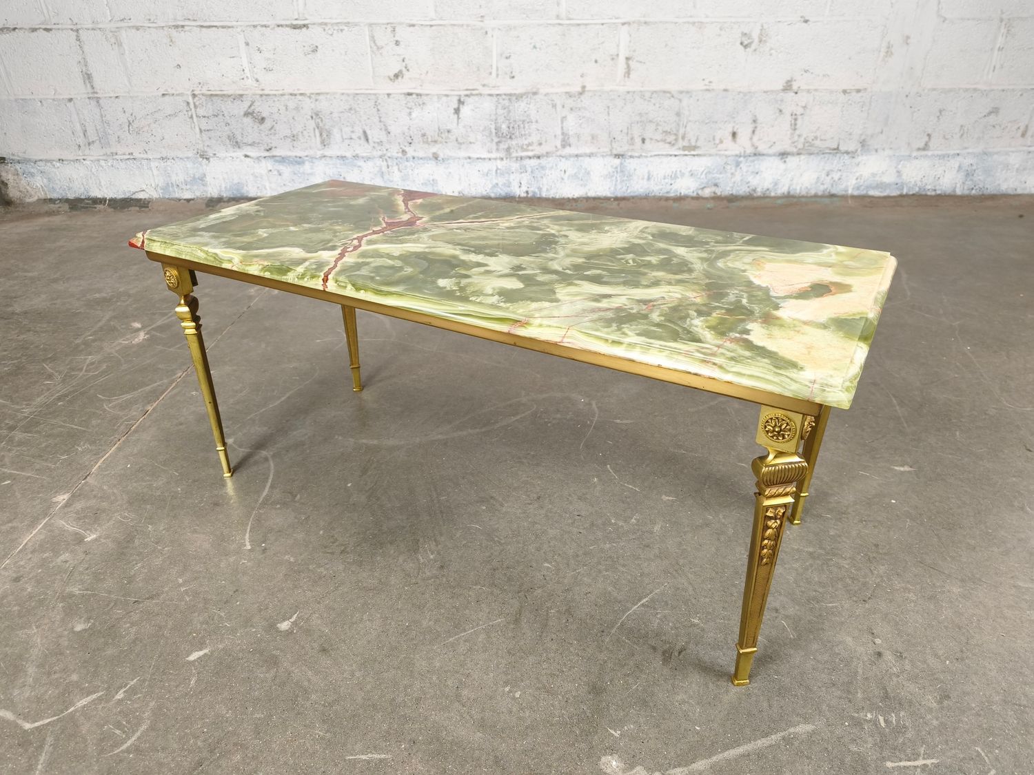 Brass coffee table with onyx tabletop