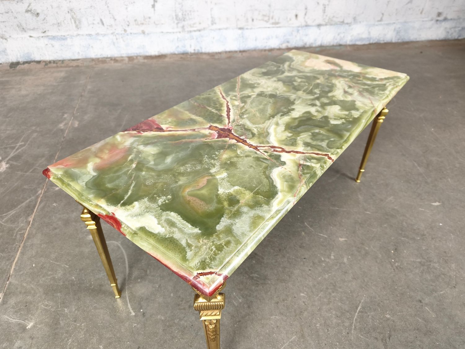 Brass coffee table with onyx tabletop