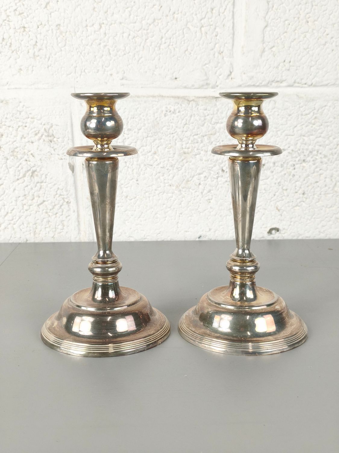 Pair of silver-plated candlesticks
