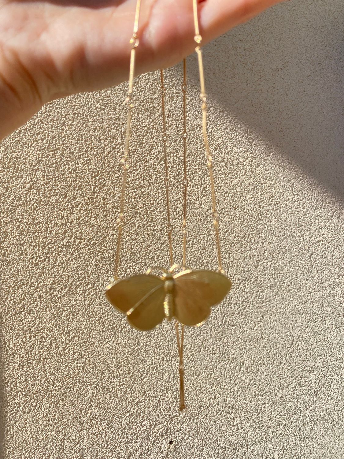 Collana con farfalla