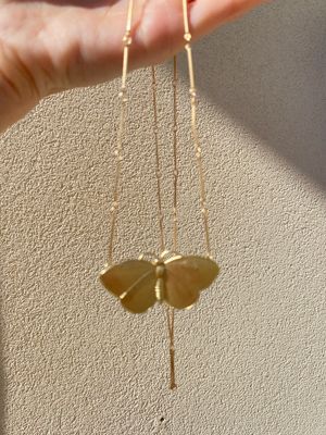 Collana con farfalla