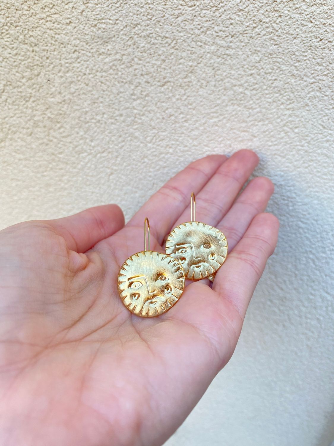 Orecchini sole acciaio