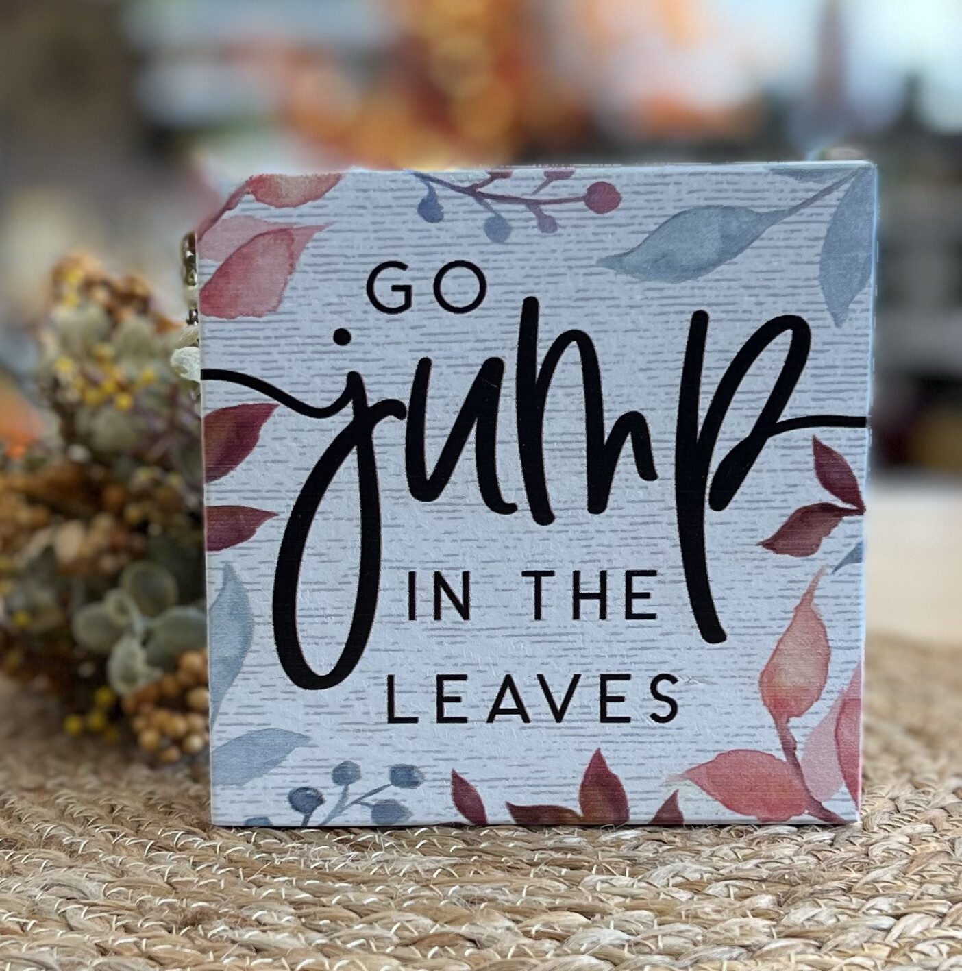 Jump in Leaves Sign