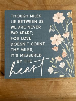 Through Miles Lie...Sign