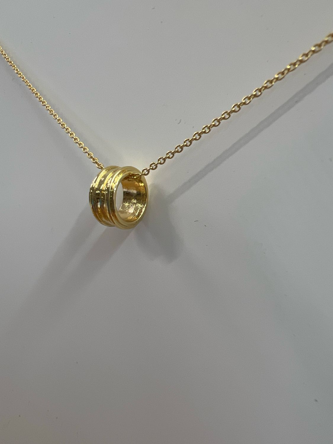 Gold Dipped Ring Pendant