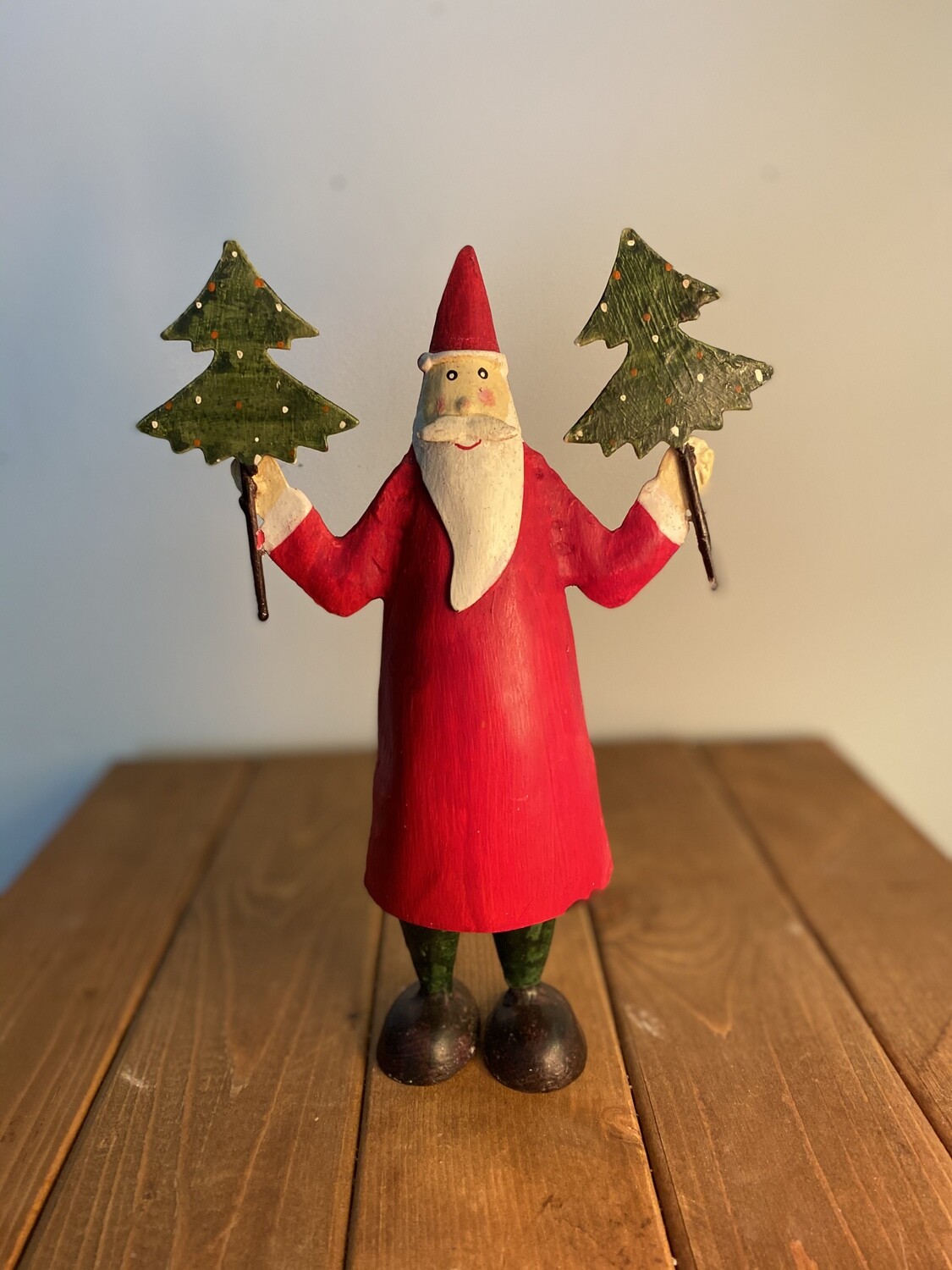 Recycled Painted Metal Santa Holding Two Trees Recycled Painted Metal Santa Holding Two Trees