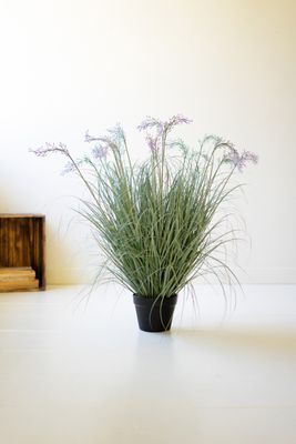 Artificial Grass w/Flowers in a Black Plastic Pot