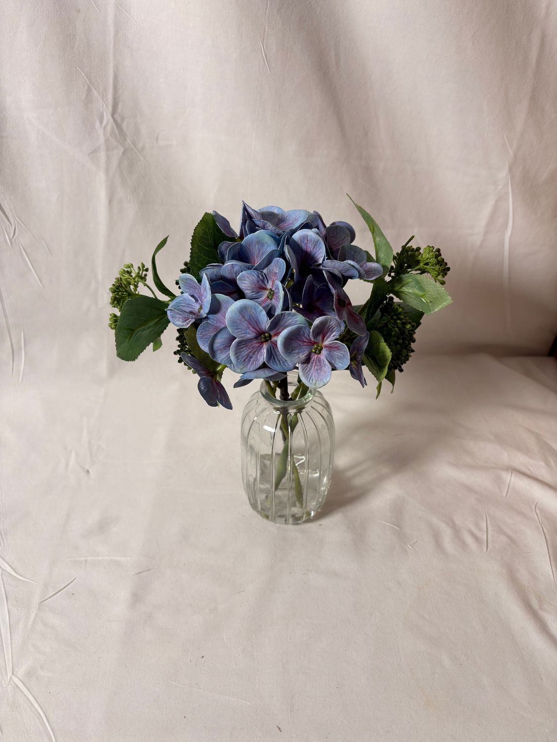 Hydrangea/Skimmia in Glass Vase 9" Purple