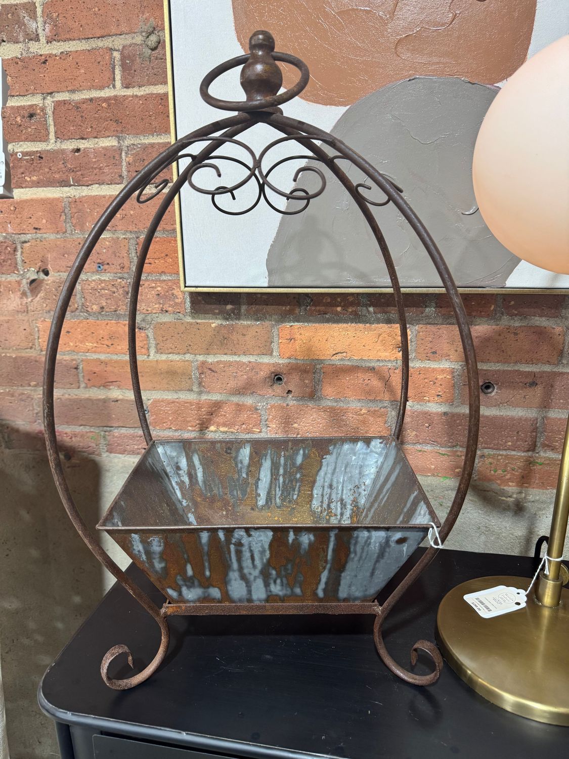 Rustic Metal Basket On A Stand