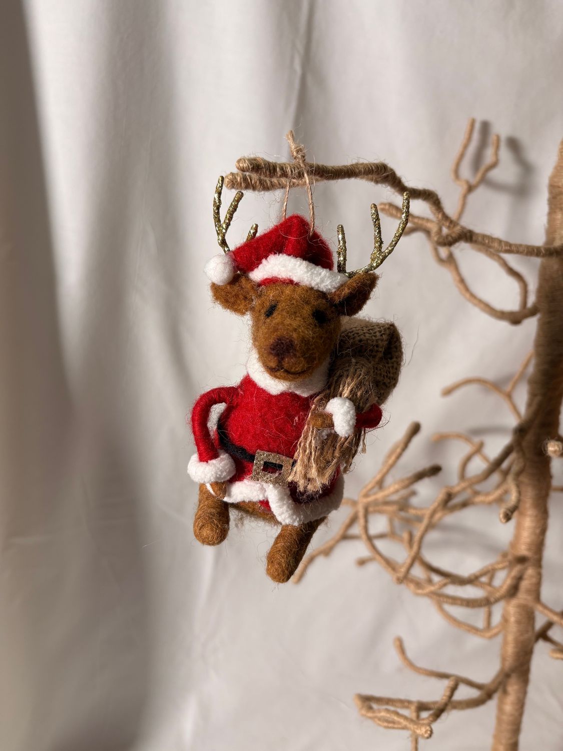 Felt Reindeer Santa Holding Bag of Toys Ornament