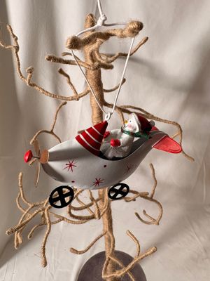 Metal White Airplane w/Snowman Ornament Metal White Airplane w/Snowman Ornament