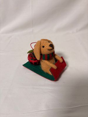 Felt Dog on Green Sleigh w/Gift Ornament Felt Dog on Green Sleigh w/Gift Ornament