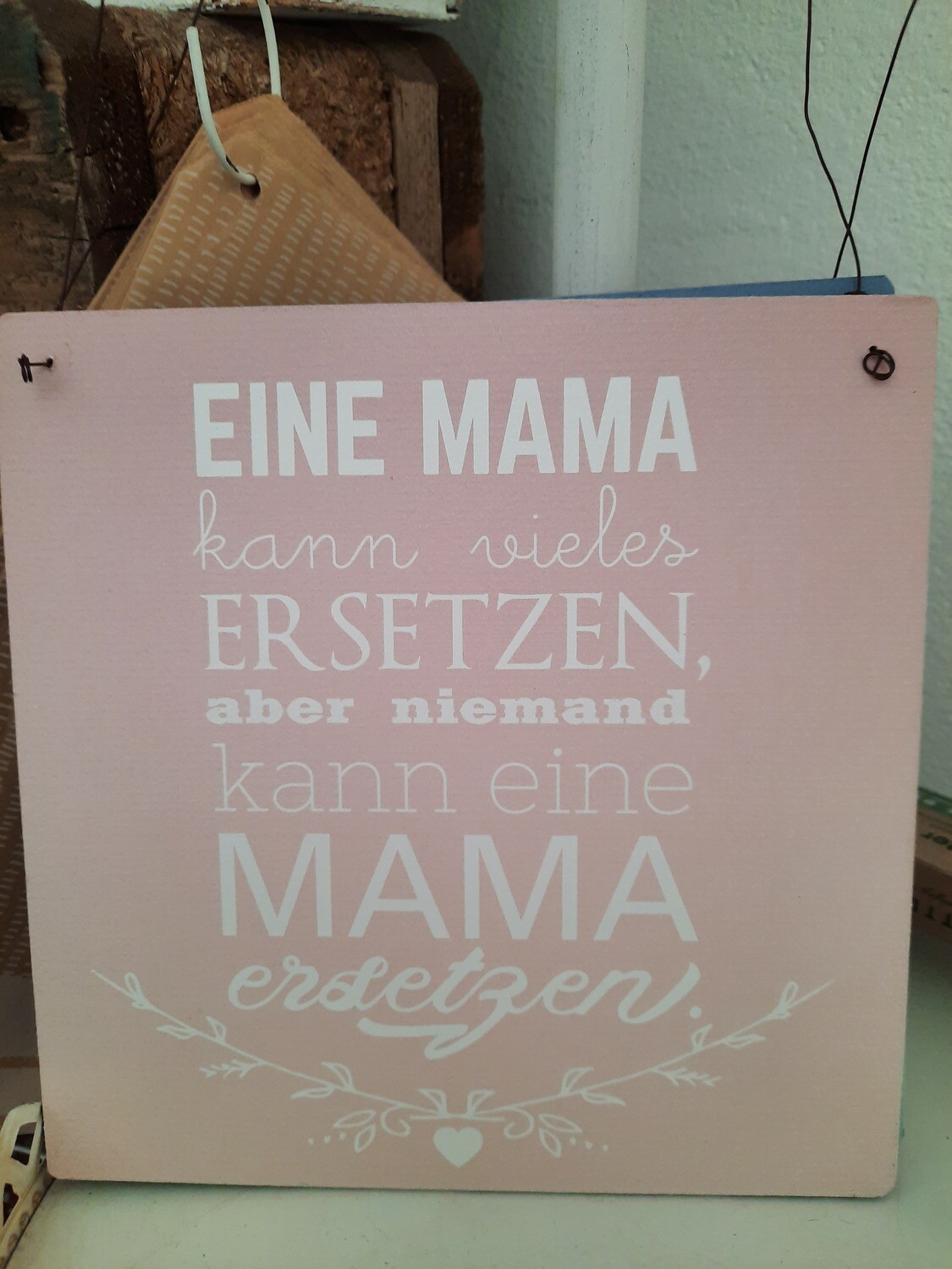 Schild: eine Mama....