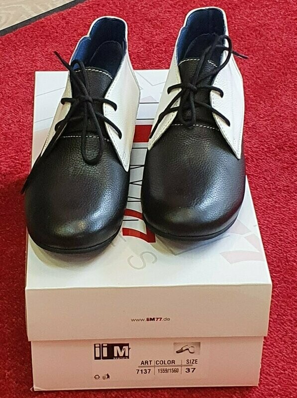 Schuhe   70%  Reduziert