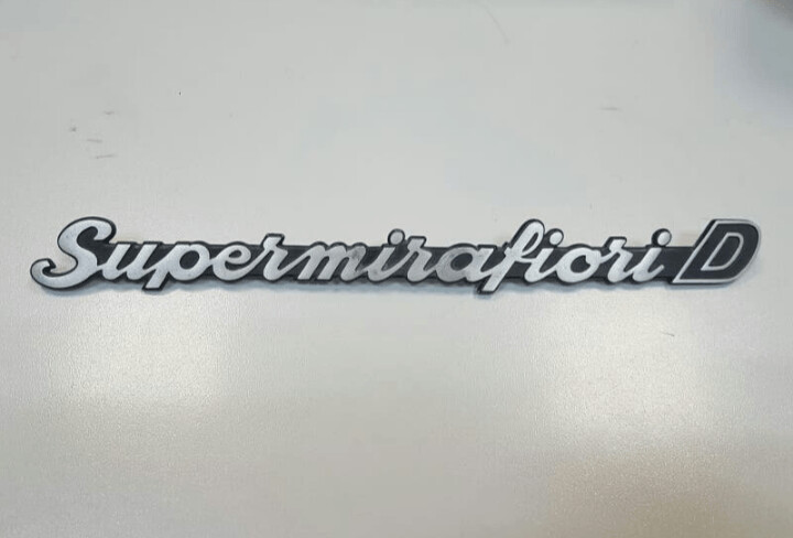 Anagrama o insignia Seat 131 supermirafiori