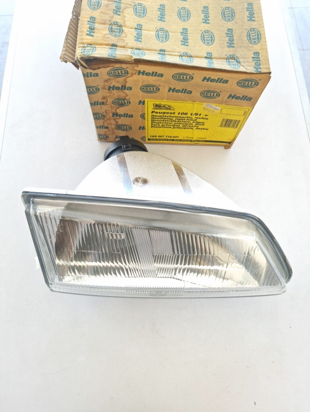 Optica faro delantero derecho PEUGEOT 106 1/91-> (hella)