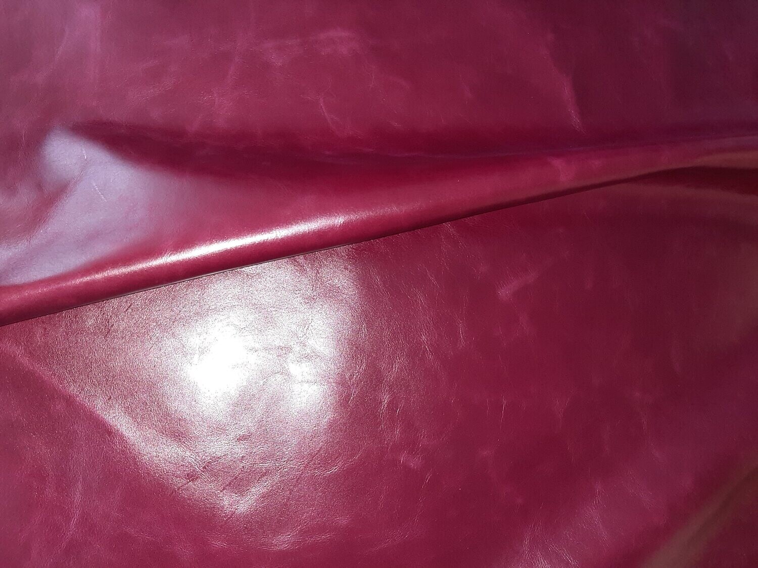 Leather bovine with shine red color