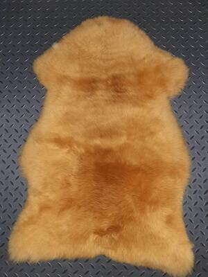 Sheepskin with natural fur, Camel color.