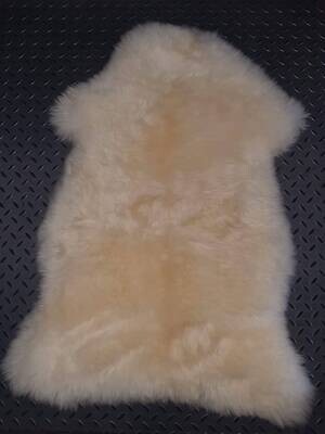 Sheepskin with natural fur, white color.