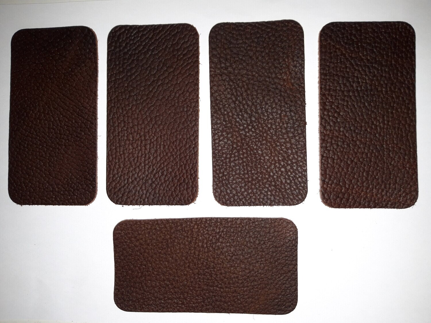 Leather pieces color brown 11,60 x 6 cm