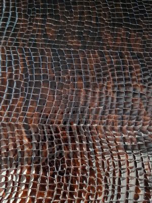 Pele bovino veniz gravado castanho