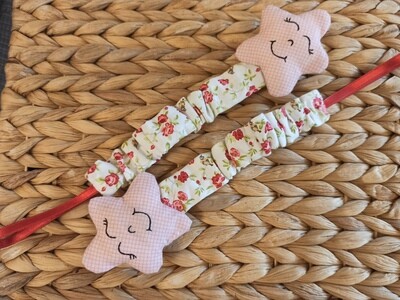 Cinta sujeta chupete con estrella rosa
