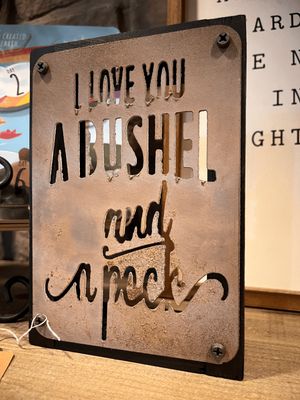 Bushel and a Peck Metal Sign