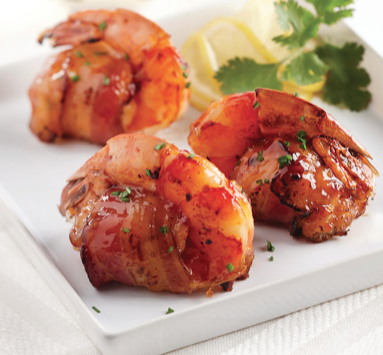 (4) Extra Large Mesquite grilled shrimp wrapped in bacon served with a garlic butter dipping sauce