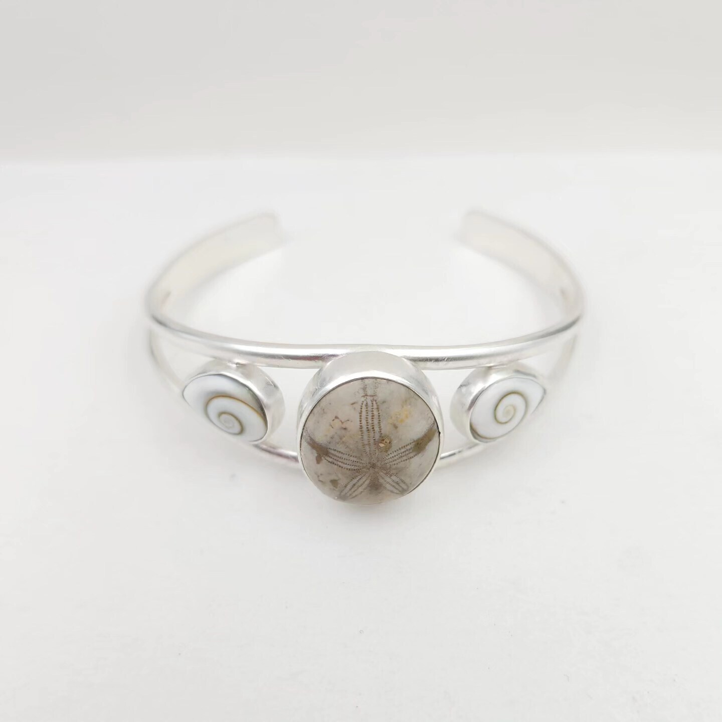 Sterling Silver Cuff Bracelet with Shiva Shells and Fossilized Sand Dollar