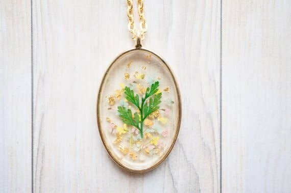 Oval Pendant Necklace with Wildflowers and Tiny Leaf