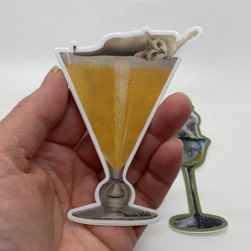 Cat On A Glass Of Orange Juice Sticker