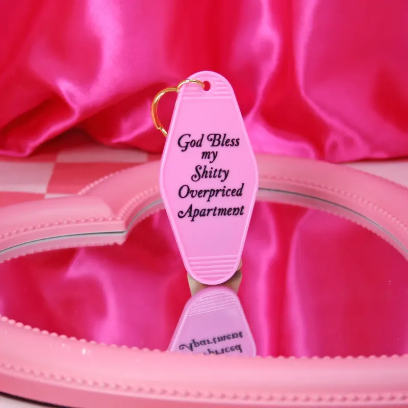 God Bless My Shitty Apartment Keychain Pink