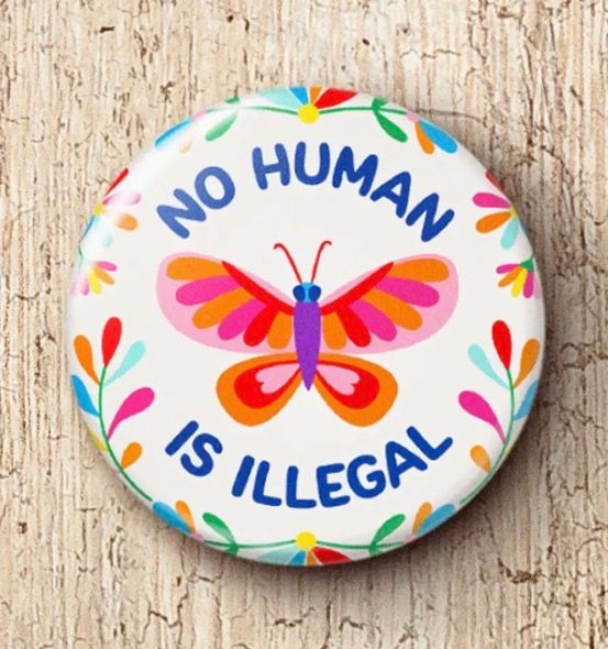 No Human Is Illegal 1” button