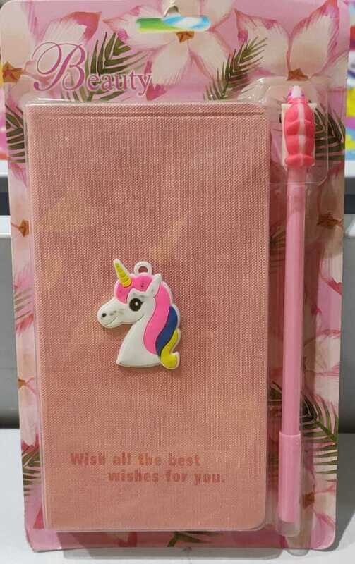unicorn notebook with pen