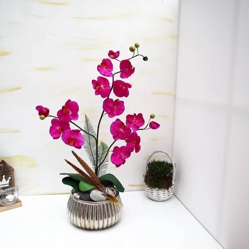 Gesteck edel Tischgesteck pinke Orchidee Tischdekoration