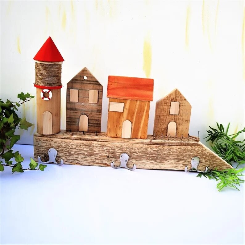 Wandgarderobe maritim Hakenleiste Leuchtturm rot Wandgarderobe maritim Hakenleiste Leuchtturm rot